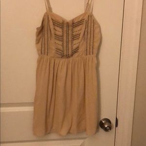 nude pink dress with cut out in the back